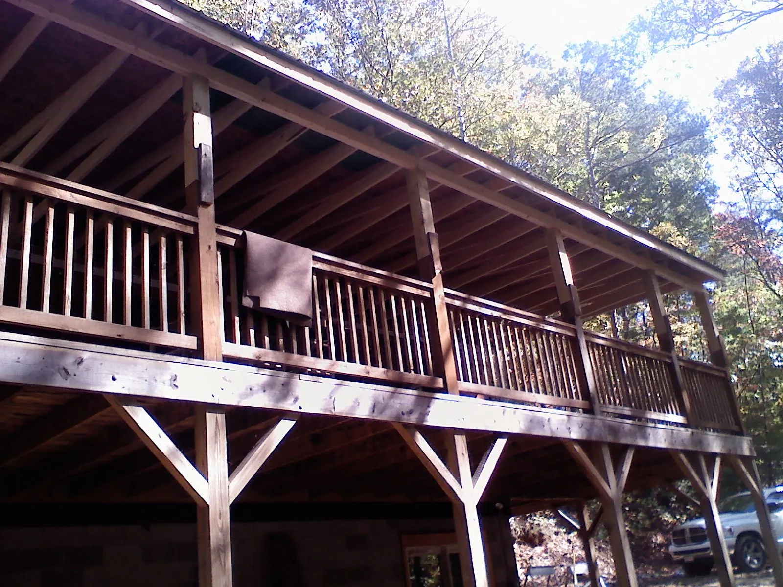 Timber framing under a new elevated porch and deck — Roof Leak Repair in Spurger by Roofing Brothers